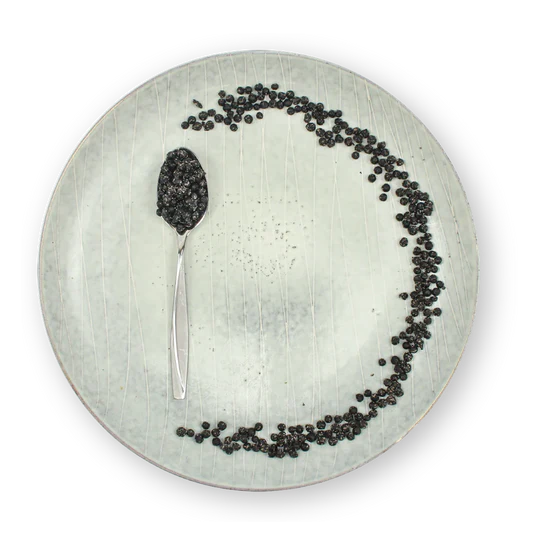 Fermented Green Peppercorns in a plate – tangy, soft-textured spice from New York used by NYC restaurants