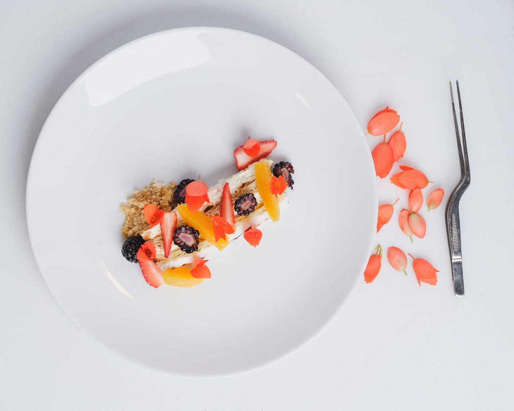 Incan Begonias on a gourmet dish – tart and juicy petals styled for NYC fine dining